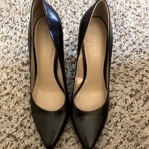 Nine West black pumps.